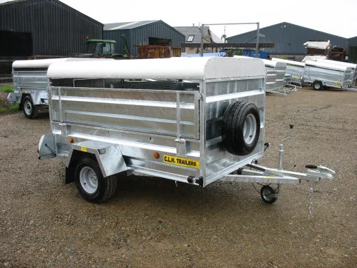 A galvanised CLH single-axle livestock trailer with a canvas canopy roof