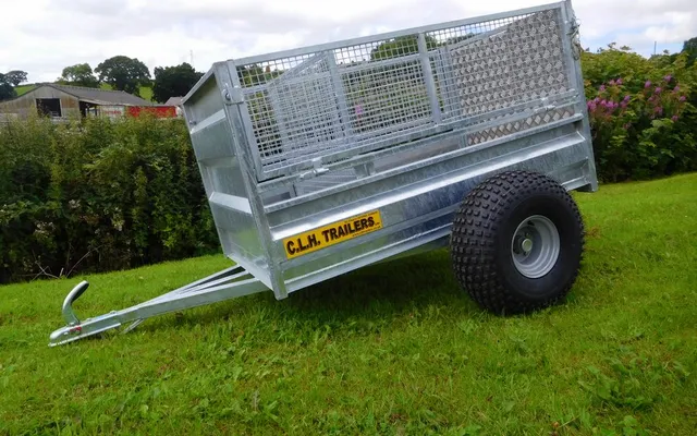 A galvanised CLH tipping trailer with mesh sides