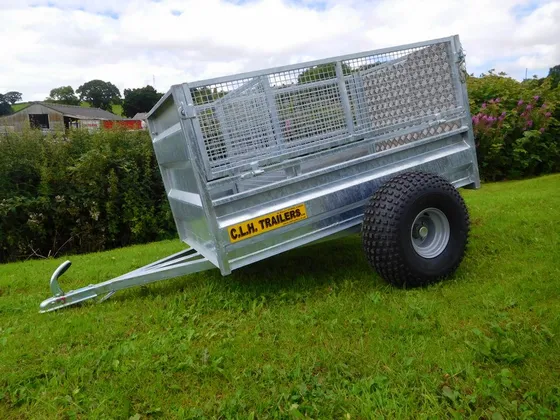 A galvanised CLH tipping trailer with mesh sides