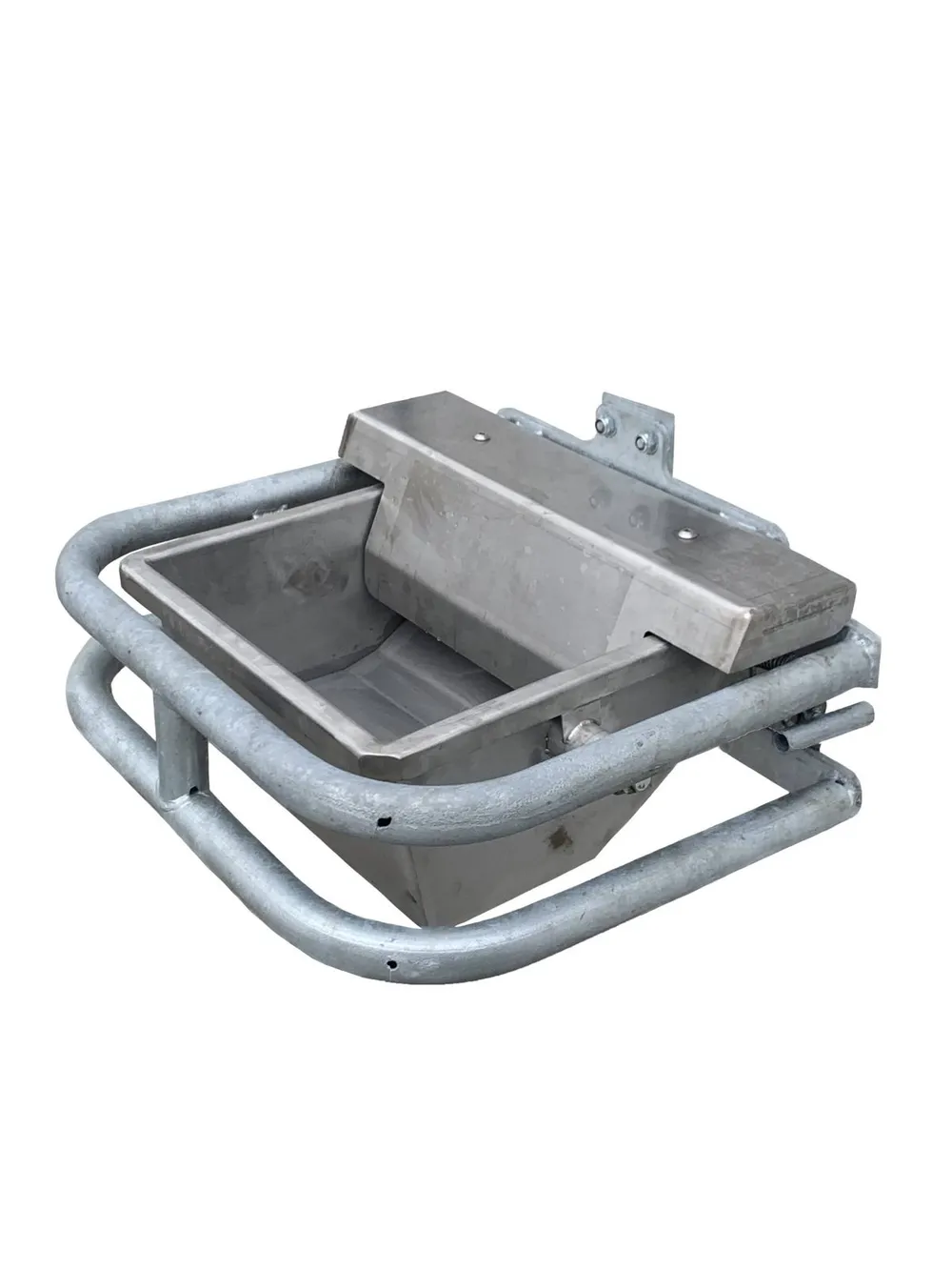The stainless drinker inside its galvanised tubular guard, tipped open to show the bowl