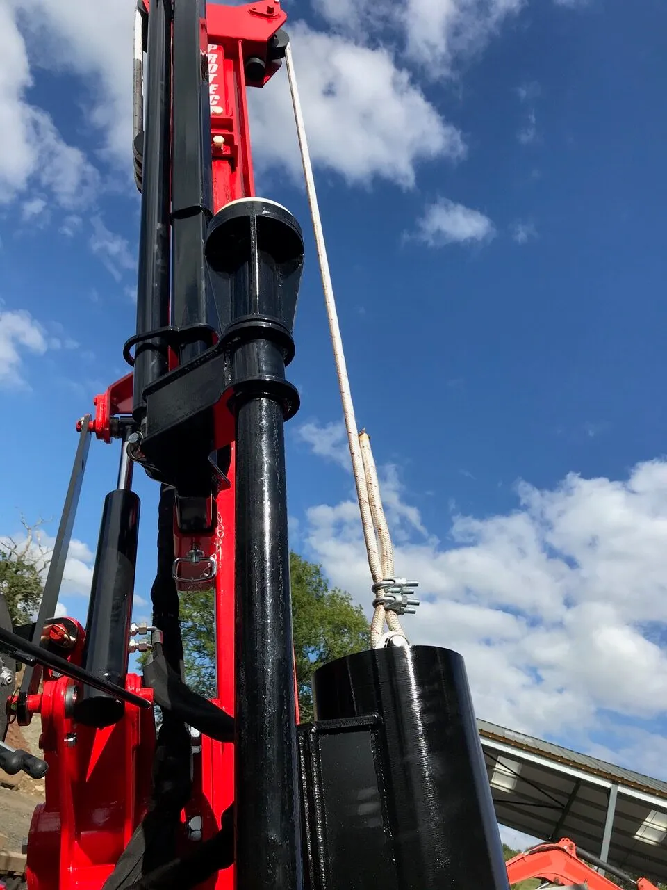Looking up the mast, with a post held in the driving cone